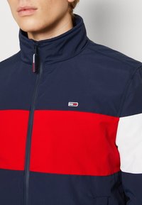 Tommy Jeans Allvädersjacka - dark blue