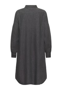 Fekete denimszoknya, gombos gallérral, hosszú ujjal, gombos mandzsettával és enyhén ívelt aljjal. Puha, texturált anyag.