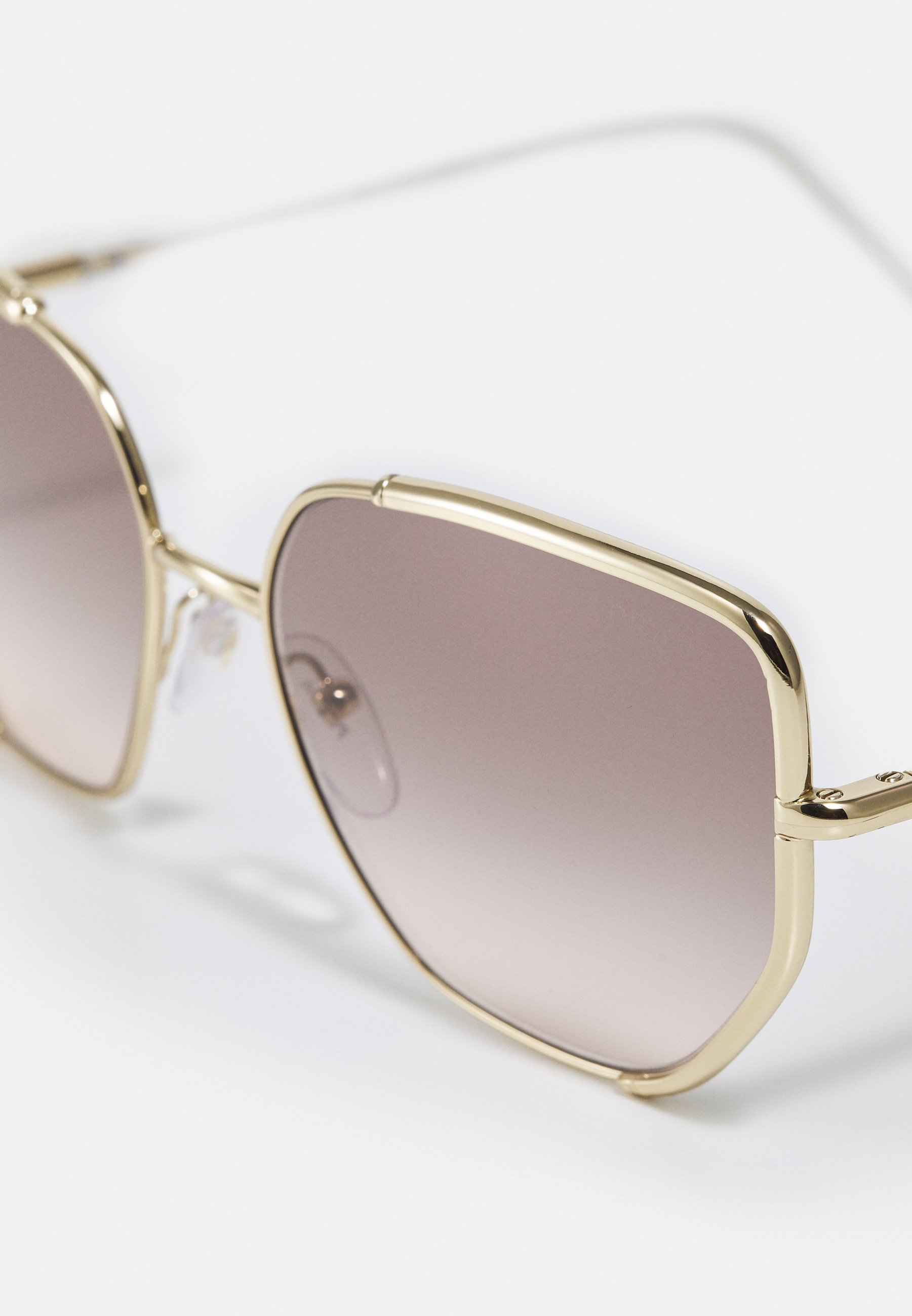 prada sunglasses gold