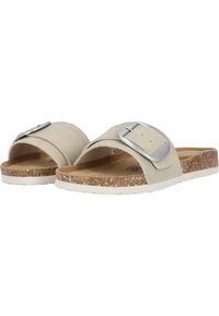 Helle beigefarbene Rutsch-Sandalen mit einem breiten Riemen und silberner Schnalle. Verfügt über ein Korkfußbett und eine weiße Gummisohle für Komfort.
