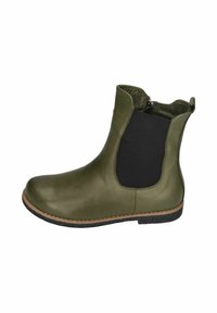 Green leather ankle boot with black elastic panel, round toe, and textured black rubber sole. Stitching detail along the edge.