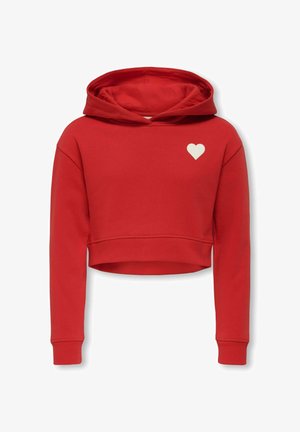 Punainen lyhyt huppari, joka on valmistettu puuvillasekoitteesta. Siinä on etu-tasku ja pieni valkoinen sydänlogo vasemmassa rinnassa.