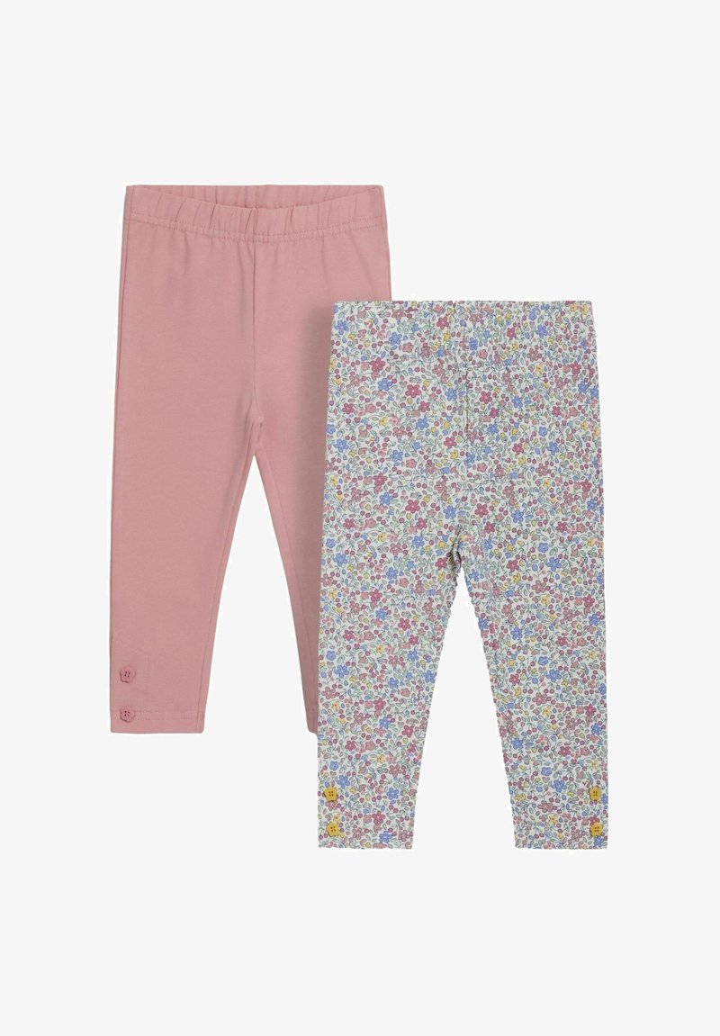 Două perechi de leggings: una roz solid cu talie elastică și accente cu nasturi, cealaltă cu un model floral colorat pe un fundal alb.