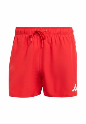 Rote Badeshorts aus leichtem Material, ausgestattet mit einem elastischen Bund und einem Kordelzug, einer vorderen Naht und einem weißen Logoakzent.