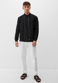 s.Oliver Poloshirt - schwarz