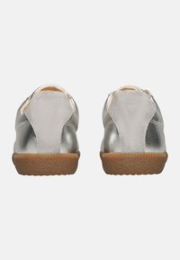 Silver leather shoes with a smooth texture, rounded shape, and a gum rubber sole. The heel features a subtle tab for easy wear.