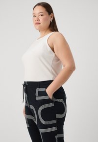 ONLY Carmakoma CARGOLDTRASH CLASSIC NEW - Hlače - black