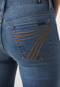 Modern Dojo bootcut Jeans