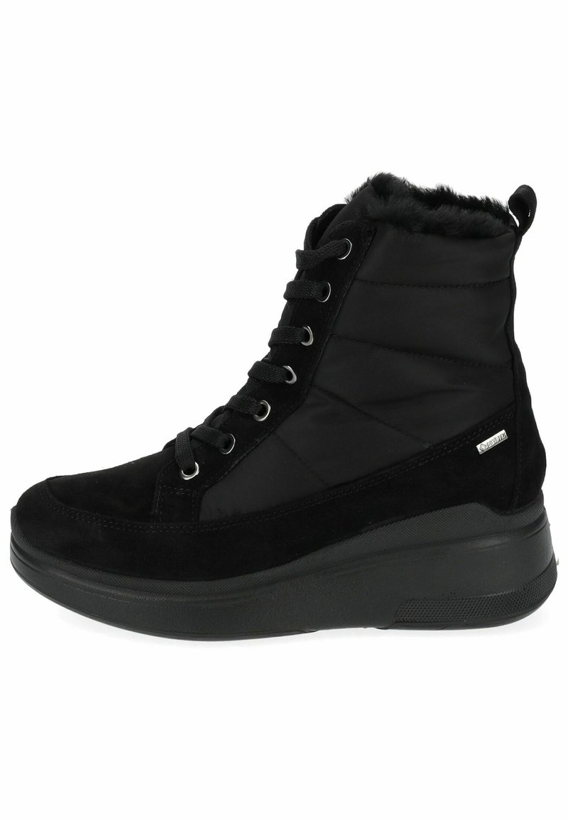 Botas negras hasta el tobillo con parte superior de ante y nylon acolchado, con forro de piel sintética, punta redonda y suela de goma texturizada. Cierre con cordones en la parte frontal.