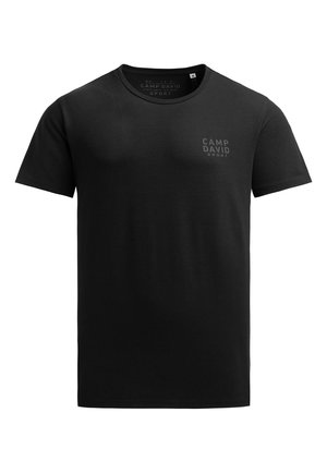 Black short-sleeve t-shirt made of cotton featuring a small, tonal logo on the chest. Classic crew neck design. Soft texture, casual fit.