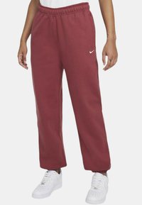 Nike Sportswear Teplákové kalhoty - red