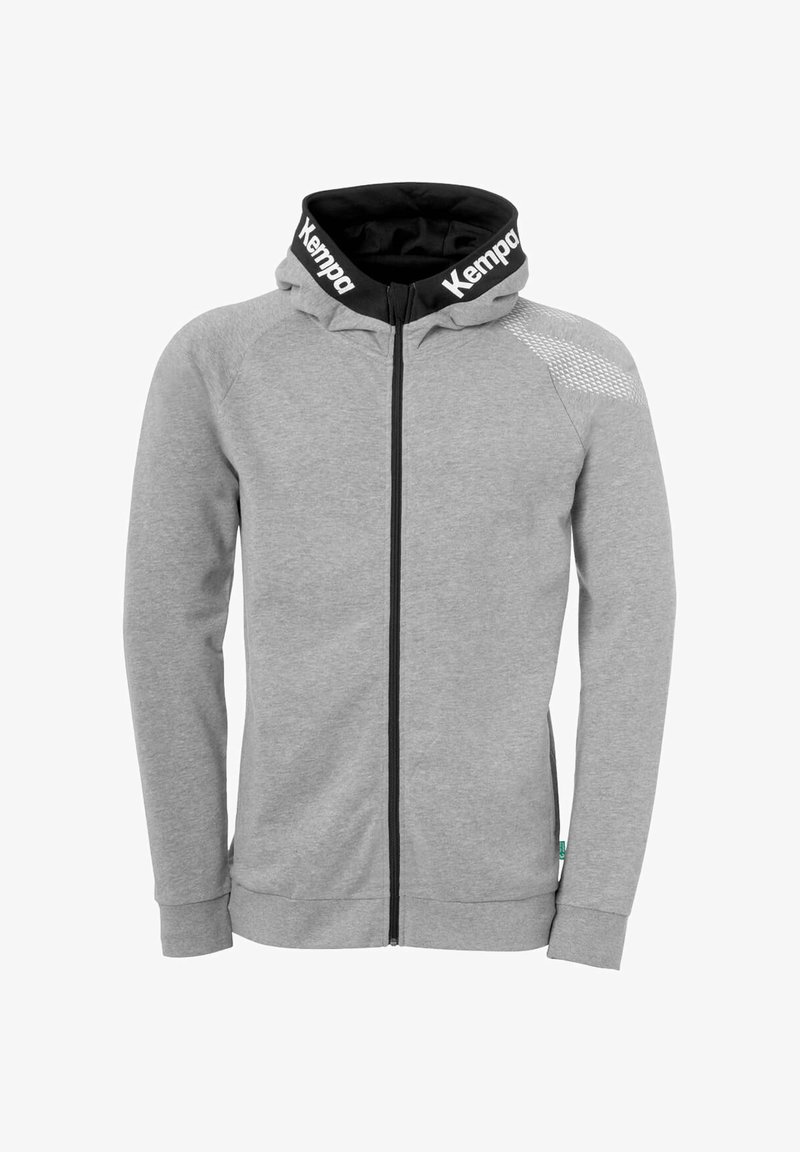 Grå zip-front hoodie lavet af blødt stof, har en sort foret hætte, hvid "Kempa" branding på kraven og teksturerede detaljer på skulderen.