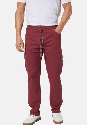 Burgunderfarbene Cargo-Hosen mit einer Kordelzug-Taille, Seitentaschen und einem entspannten Schnitt. Aus Baumwolle mit einer glatten Textur gefertigt.