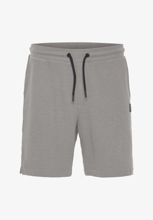 Graue Shorts mit Waffelstruktur, einem Kordelzugbund, Seitenschlitzen für Bewegungsfreiheit und einem kleinen Markenschild auf der linken Seite.