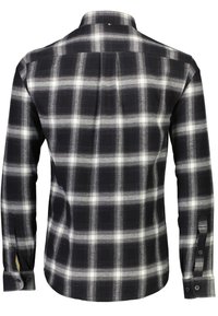 Camicia a maniche lunghe a quadratini con un motivo bianco e nero, polsini con bottoni e colletto classico. Realizzata in tessuto di cotone con una consistenza morbida.