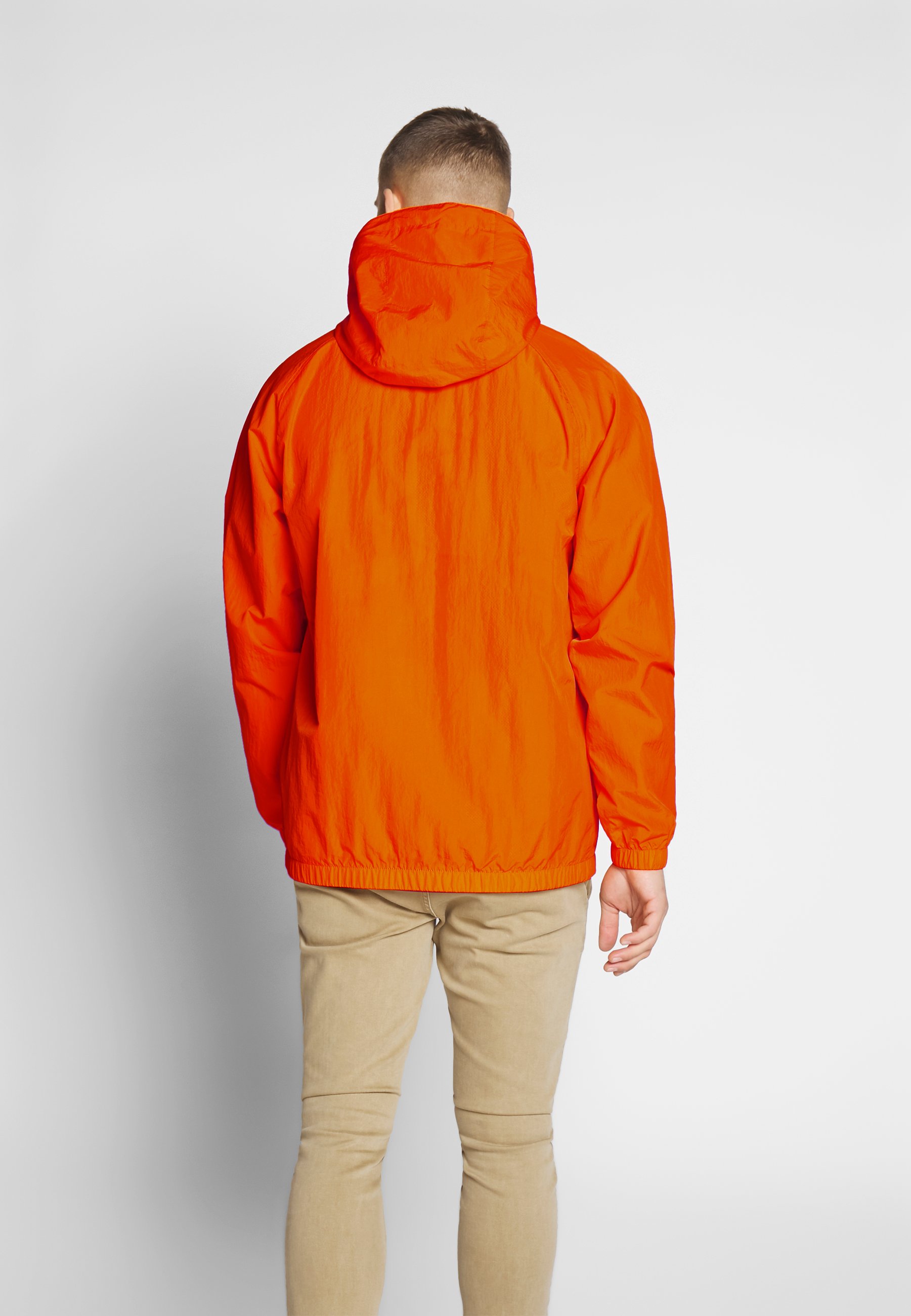 orange windbreaker nike