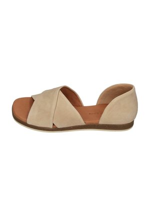 Beige open-toe sandal with crisscross suede straps and a flat sole, designed for casual wear.