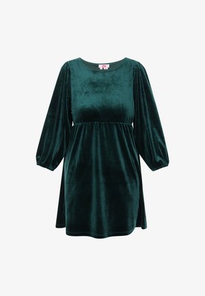 Roheline sametkleit pikade, puhvärviliste varrukatega, ümmarguse kaelusega, impeeriumi vöökohaga ja lehvitud siluetiga, millel on sile ja pehme tekstuur.