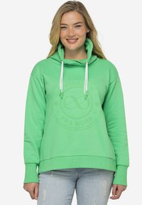 Sudadera verde de algodón, con un gran logo en relieve en la parte frontal, cintillas ajustables y un corte holgado con puños de canalé.