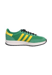 Green athletic shoe with yellow stripes, black laces, and white sole, viewed from the side on a white background.