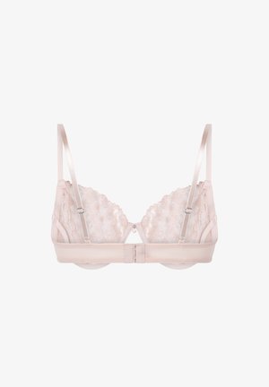 Soutien-gorge rose pâle avec des finitions en dentelle, doté de bretelles réglables, de coques rembourrées douces et d'une fermeture à crochets au dos. Il présente un accent décoratif au centre.
