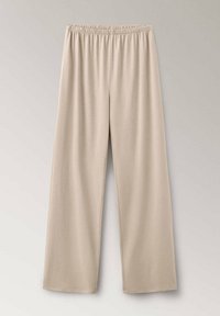 Pantalon beige à jambes larges avec taille élastique, en tissu doux, présenté de face sur un fond clair.