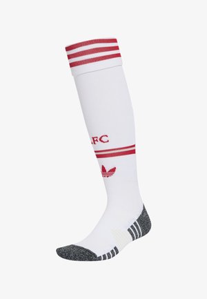 Chaussette blanche montante jusqu’au genou avec des rayures rouges et le texte « LFC », avec un logo Adidas trefoil rouge et des zones noires rembourrées aux orteils et au talon.