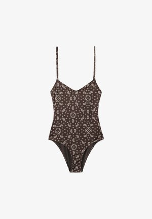 Maillot de bain une pièce marron avec bretelles fines et motif paisley blanc uniformément réparti sur le tissu.
