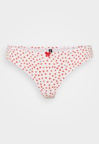 Cotton thong in white with a red and black heart pattern. Features a small red bow at the front. Soft texture with a comfortable fit.
