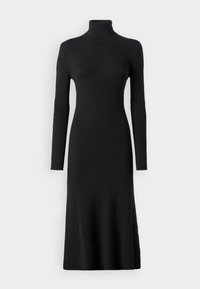 Vestito nero a coste con scollatura alta, maniche lunghe e silhouette aderente, che arriva fino a metà polpaccio.