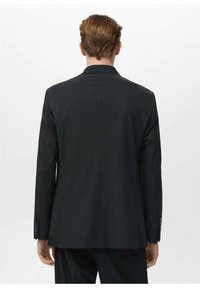 Black suit jacket with a tailored fit, smooth fabric, notched lapels, and buttoned cuffs. Clean lines and structured silhouette.
