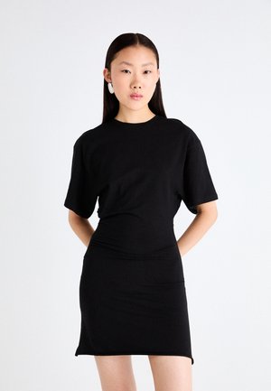 Black cotton dress with short sleeves, fitted design, and a straight silhouette. Smooth texture and minimal detailing, mid-thigh length.