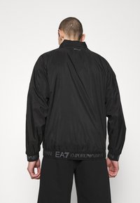 EA7 Emporio Armani Tunn jacka - black