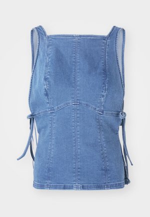 Denim top in light blue, featuring a fitted design, wide straps, side ties, and seam detailing for a structured appearance.