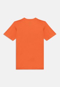 T-shirt met korte mouwen in feloranje katoen. Klassiek crewneck ontwerp, zachte stof en een eenvoudige achterkant met minimale stikseldetails.