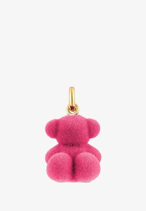 Charm en peluche rose en forme d'ours en peluche avec une boucle en métal doré. Forme ronde, texture douce et petites oreilles. Coutures visibles et surface lisse et duveteuse.
