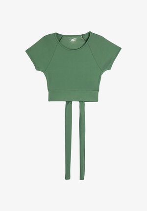 Vihreä lyhythihainen urheilu paita, jossa on vyötäröllä solmukohta. Valmistettu sileästä, joustavasta materiaalista.