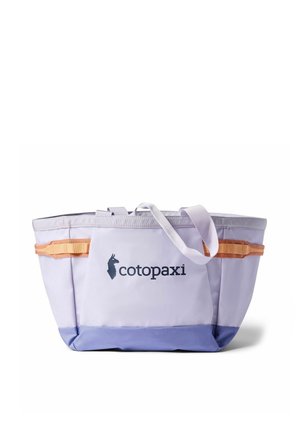 Lavender and light blue tote bag with orange side handles, white shoulder strap, and cotopaxi logo on front pocket.