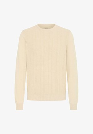Roomkleurige trui met lange mouwen, geribbelde textuur en verticaal patroon, ronde hals en aansluitende manchetten. Zachte gebreide stof.