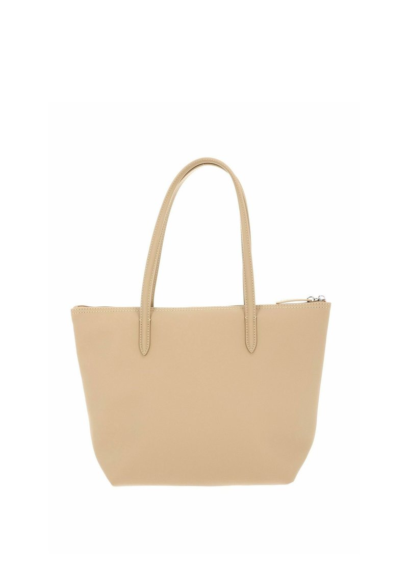 Beige leather tote bag with two handles and a zippered top, simple and smooth design without external pockets or logos.