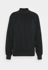 Černá halenka s dlouhým rukávem, shromážděným vysokým výstřihem, elastickými manžetami a pasem, s uzávěrem na zip na zadní straně.