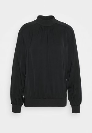 Black long-sleeve blouse with gathered high neckline, elastic cuffs, and waistband, featuring a back zipper closure.