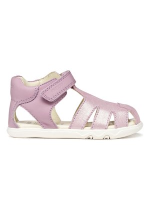 Sandalo in pelle lilac per bambini con ritagli, cinturino regolabile in velcro e suola bianca in gomma flessibile.