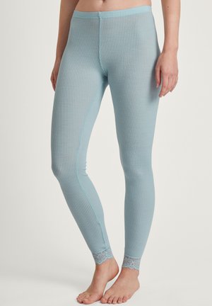 Lichtblauwe geribbelde leggings met een aansluitend ontwerp en kanten accenten bij de enkelranden. Gemaakt van zacht, rekbaar materiaal voor comfort.