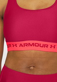 Under Armour CROSSBACK MID BRA - Sutiã desportivo de suporte médio - black rose/penta pink/black rose