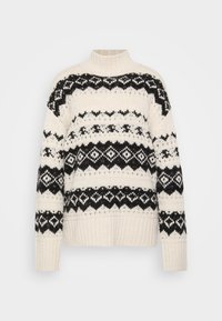 Cremfarbener Pullover mit hohem Kragen, schwarzem geometrischem Muster sowie gerippten Bündchen und Saum. Weicher Strickstoff, lässiger Oversized-Schnitt.