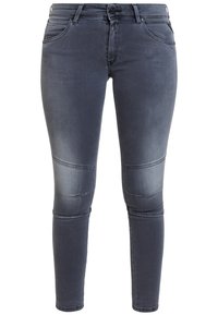 Tajta jeans i mörkgrå denim med en mjuk textur, knäpaneldetaljer och klassisk femficksdesign med dragkedja.