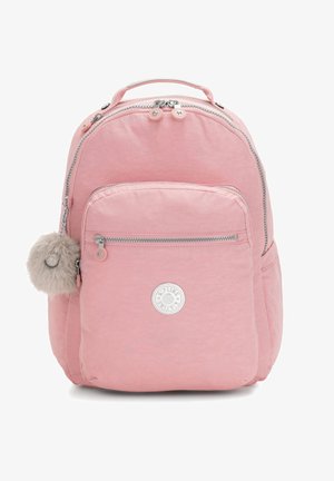 Rosa Nylon-Rucksack in runder Form, mit einer Fronttasche, Reißverschluss und einem fellbesetzten Pompom-Akzent. Rundes Logo auf der Vorderseite.