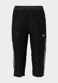 Μαύροι υφασμάτινοι αθλητικοί παντελόνες Adidas με ελαστική μέση, λευκές πλαϊνές ρίγες και μικρό λευκό λογότυπο Adidas στον μηρό, μήκος μέχρι τον αστράγαλο.