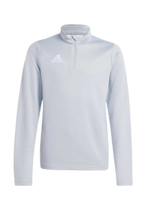 Lysegrå langærmet sports-pullover med kvartlynlås og hvid Adidas-logo på venstre bryst, vist på ens hvid baggrund.